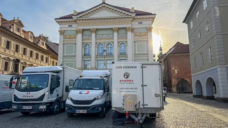 Vozy a přívěsy Energy Partner před budovou divadla